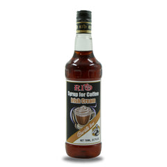 A 700ml bottle of RIO Syrup for Coffee, labeled "Irish Cream." The amber-colored liquid is visible through the transparent glass bottle. The label features an image of a coffee with cream, under the caption "Barista Line