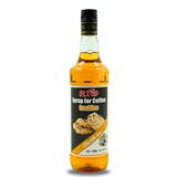 A bottle of RIO syrup for coffee is labeled "Cookies" flavor. The bottle contains 700ml of syrup. The label features images of cookies the syrup inside is a golden caramel color.