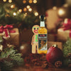 Animated Gingerbread Man waving next to bottle of gingerbread syrup in a christmas setting